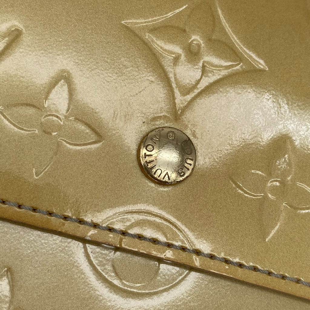 Portefeuille Louis Vuitton International Vernis dorée