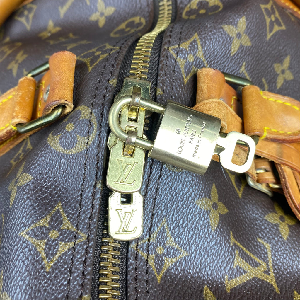Louis Vuitton Keepall 45 Bandoulière - certifié entrupy